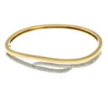 A 9ct gold diamond hinged bangle.