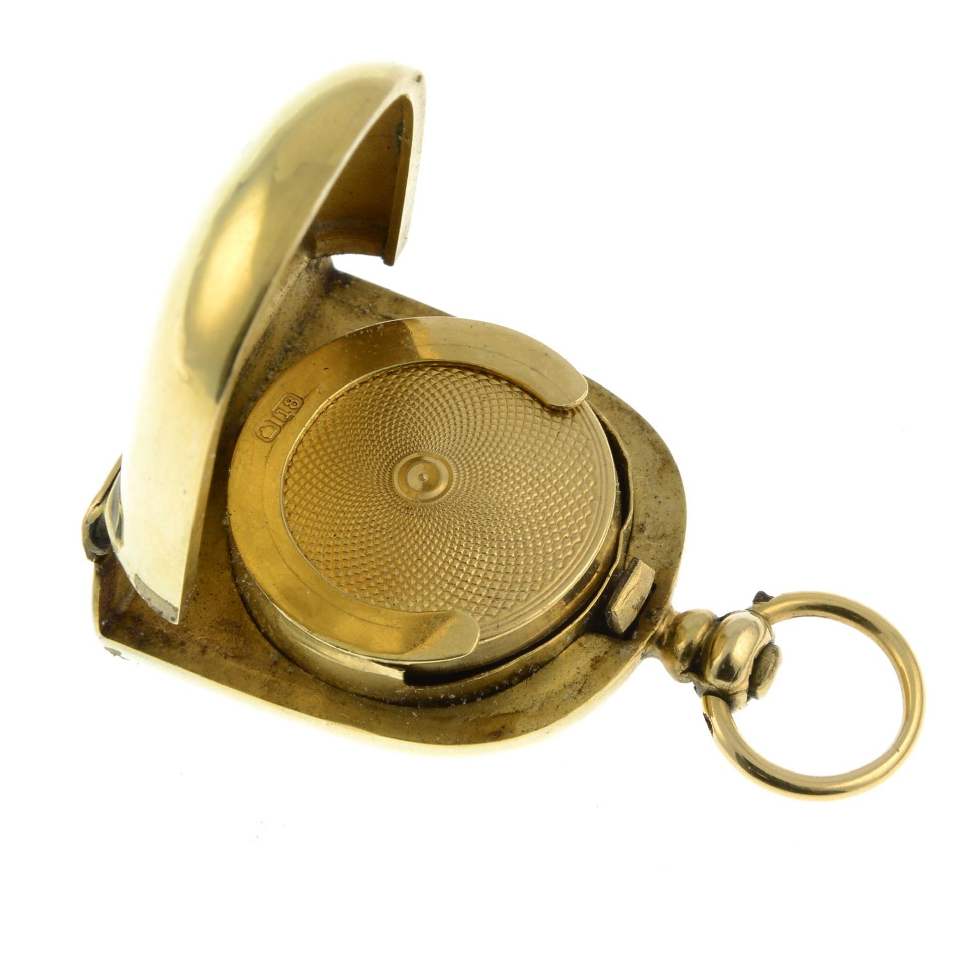 An early 20th century 18ct gold sovereign holder.Hallmarks for 18ct gold.Length 4.8cms. - Image 2 of 3