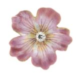 An early 20th century gold enamel and diamond pansy brooch.