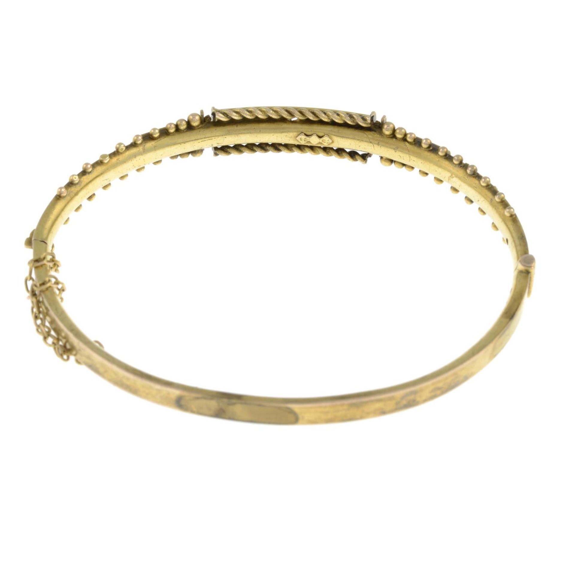 A late 19th century gold old-cut diamond and split pearl bangle, - Image 2 of 2