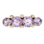 An amethyst and split pearl brooch.Length 4.2cms.