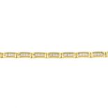 An 18ct gold brilliant-cut diamond bracelet.