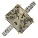An 18ct gold Csarite single-stone ring, with pave-set diamond shoulders.