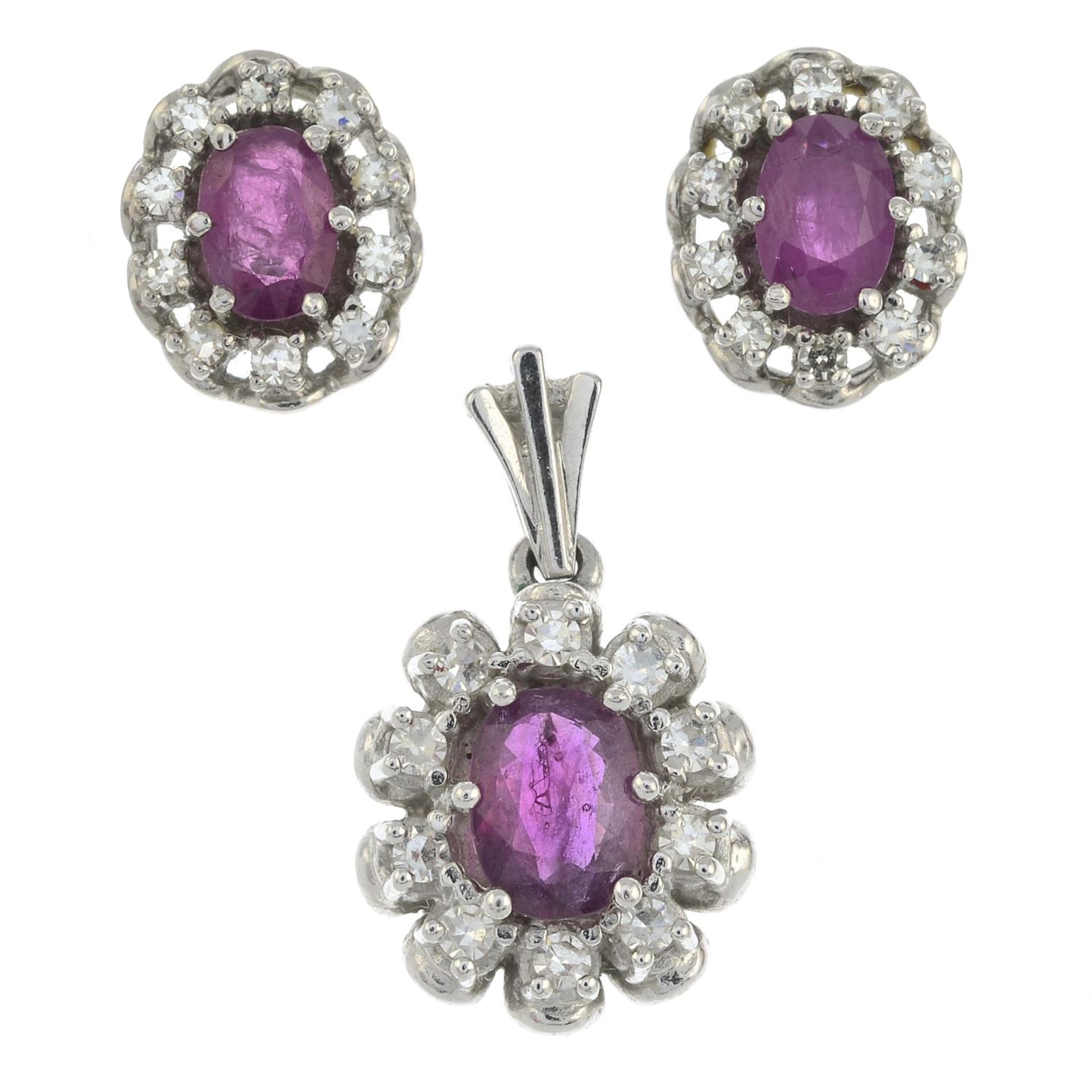 A set of ruby and single-cut diamond JewelleryTo include a pair of earrings and a pendant.