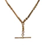 A late 19th century 9ct gold Albert chain, suspending a T-bar.Stamped 9ct.Length 35cms.