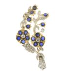 An old-cut diamond and sapphire brooch.Estimated total diamond weigh 0.70ct.Length 5.7cms.