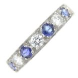 An 18ct gold sapphire and brilliant-cut diamond half eternity ring.Estimated total diamond weight
