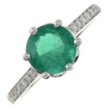 An emerald ring,