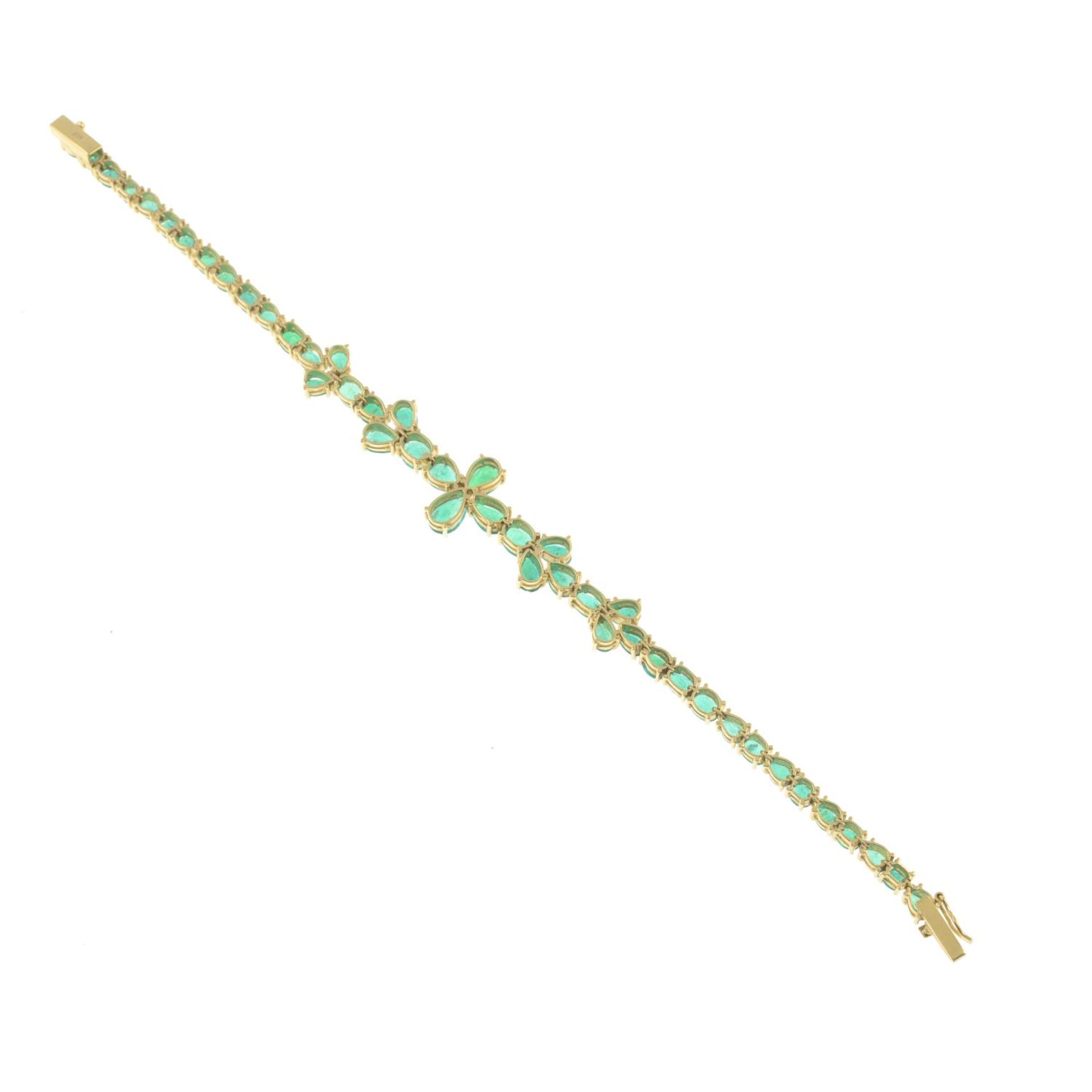 A vari-shape emerald bracelet.Stamped 18k.Length 18.5cms. - Image 3 of 3