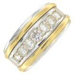 An 18ct bi-colour gold brilliant-cut diamond seven-stone ring.