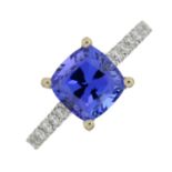 An 18ct gold tanzanite and brilliant-cut diamond dress ring.Tanzanite weight 1.96cts.Estimated