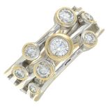 An 18ct brilliant-cut diamond dress ring.Total diamond weight 0.55ct,