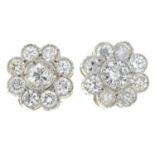 A pair of vari-cut diamond cluster earrings.Estimated total diamond weight 1ct,
