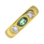 An emerald and brilliant-cut diamond three-stone band ring.Estimated total diamond weight 0.40ct,