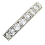 A platinum brilliant-cut diamond half eternity ring.