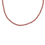 A faceted ruby necklace.Length 63.3cms.