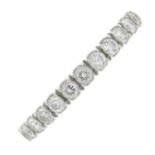 A brilliant-cut diamond half eternity ring.