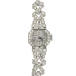 A mid 20th century platinum single-cut diamond watch.Estimated total diamond weight 0.65ct.Stamped
