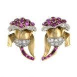 A pair of mid 20th century gold ruby and brilliant-cut diamond earrings.Estimated total diamond