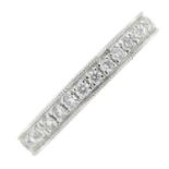 An 18ct gold brilliant-cut diamond half eternity ring.Estimated total diamond weight