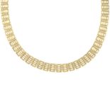 A 1970s 9ct gold fancy-link necklace.Hallmarks for Birmingham, 1976.Length 40cms.