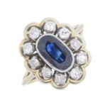 A sapphire and old-cut diamond cluster ring.Sapphire calculated weight 1.44cts,