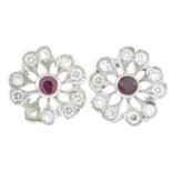 A pair of 18ct gold ruby and brilliant-cut diamond floral cluster earrings.