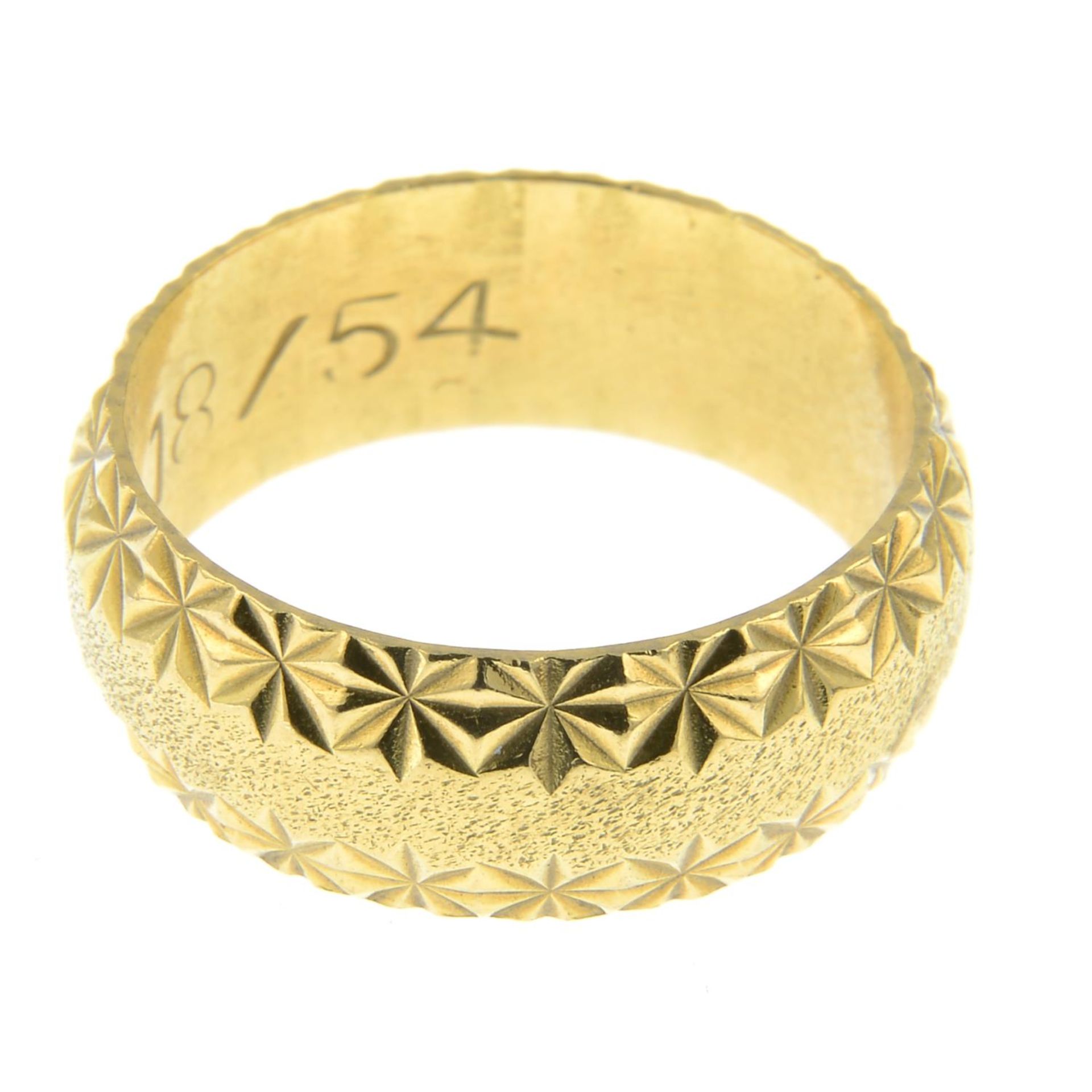 A 1970s 18ct gold textured band ring.Hallmarks for Birmingham, 1976.Ring size O. - Image 2 of 3