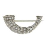 An mid 20th century old-cut diamond horn brooch.Estimated total diamond weight 0.30ct.Length