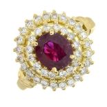 An early 20th century 18ct gold ruby and brilliant-cut diamond double cluster ring.Ruby calculated