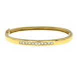 A brilliant-cut diamond bangle,