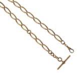 An early 20th century 9ct gold Albert chain, suspending a T-bar.Stamped 9ct.Length 41.7cms.