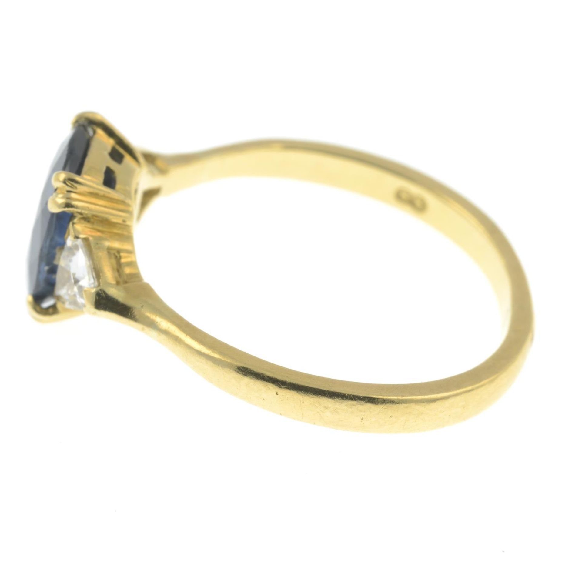 An 18ct gold sapphire and triangular-shape diamond three-stone ring.Sapphire calculated weight - Image 2 of 3