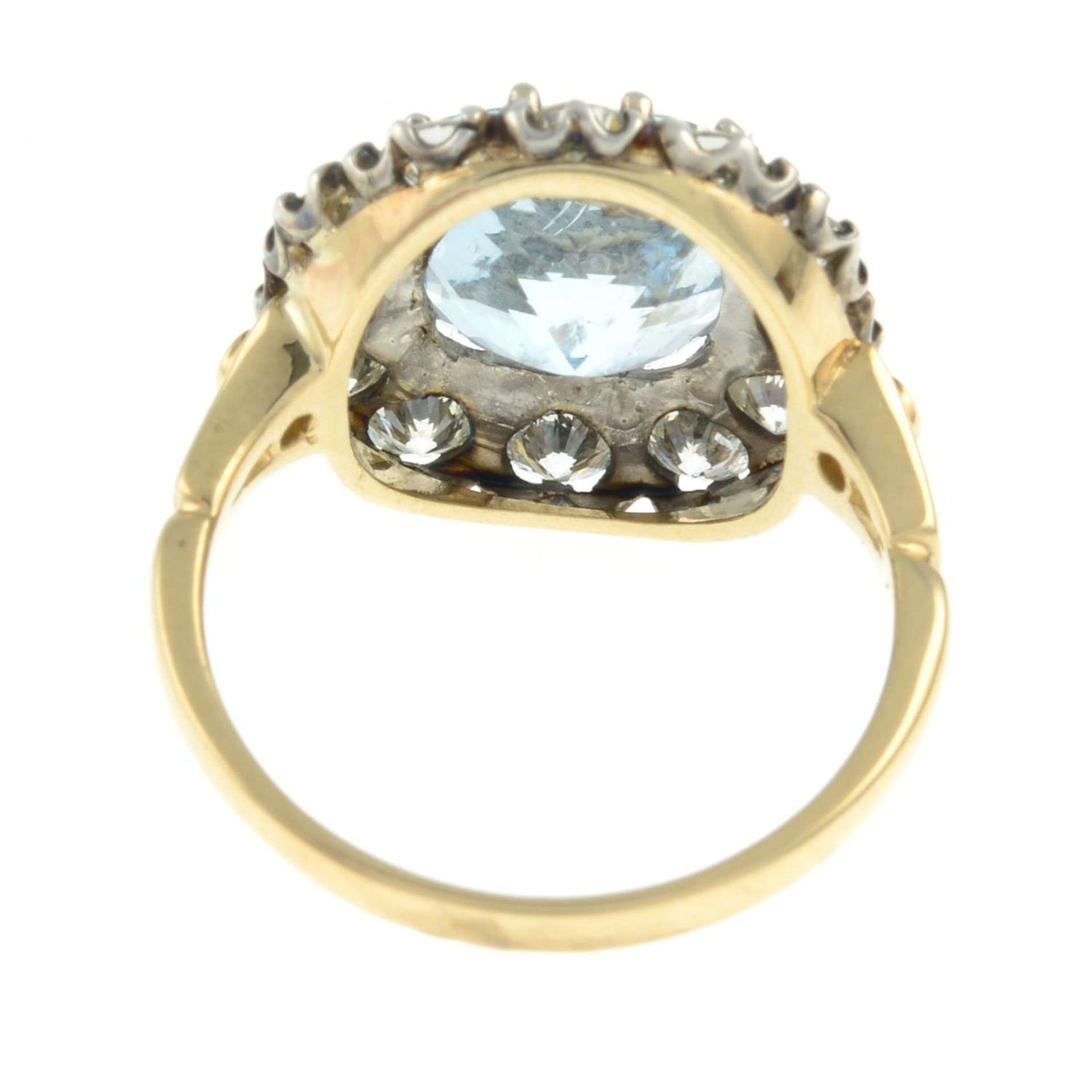An aquamarine and brilliant-cut diamond cluster ring. - Image 3 of 3