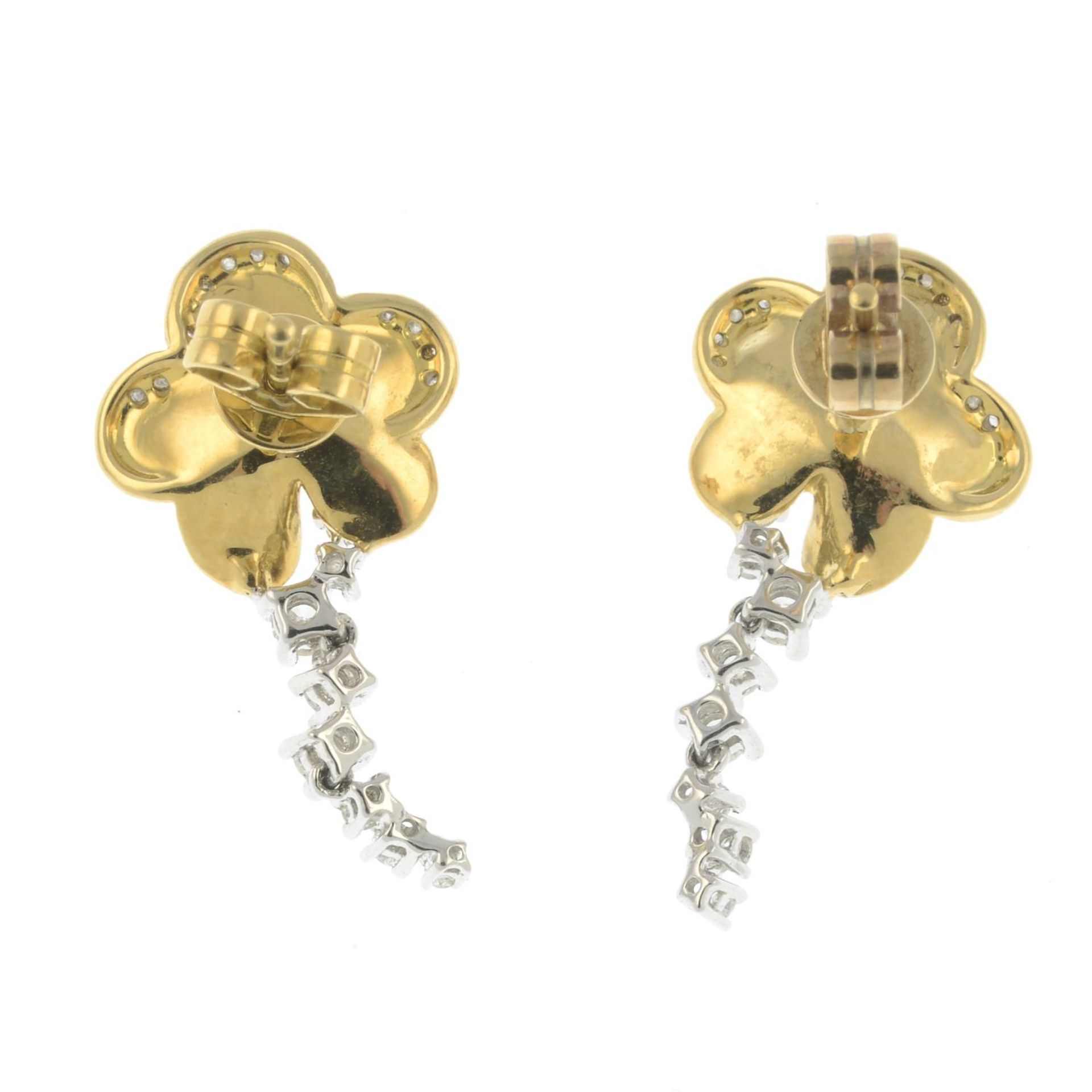 A pair of 18ct gold diamond floral earrings.Total diamond weight 0.63ct, - Image 2 of 2