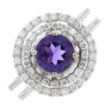 An amethyst and brilliant-cut diamond cluster ring.Amethyst calculated weight 0.85ct,