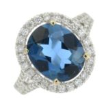 A blue topaz and brilliant-cut diamond cluster ring.