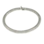 A bracelet, with push-piece clasp.Stamped 750.Length 18.5cms.