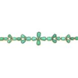 A vari-shape emerald bracelet.Stamped 18k.Length 18.5cms.