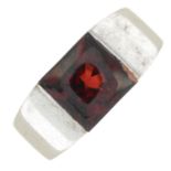 A garnet 'Tank' ring, by Cartier.Signed Cartier, E52823.Stamped 750.Ring size N.