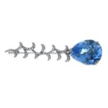 An 18ct gold blue topaz and brilliant-cut diamond brooch.Topaz calculated weight 16.43cts,