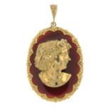A 9ct gold diamond and gem-set embossed portrait pendant of a lady.