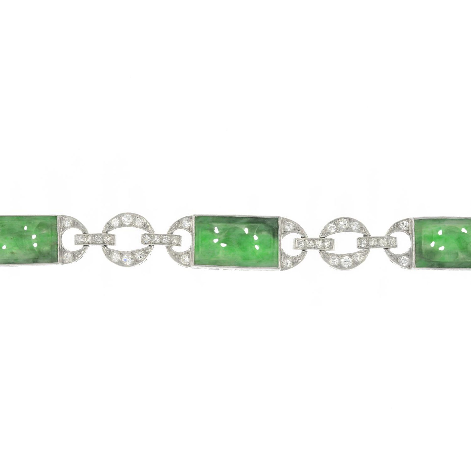 An Art Deco platinum carved jade and single-cut diamond bracelet.