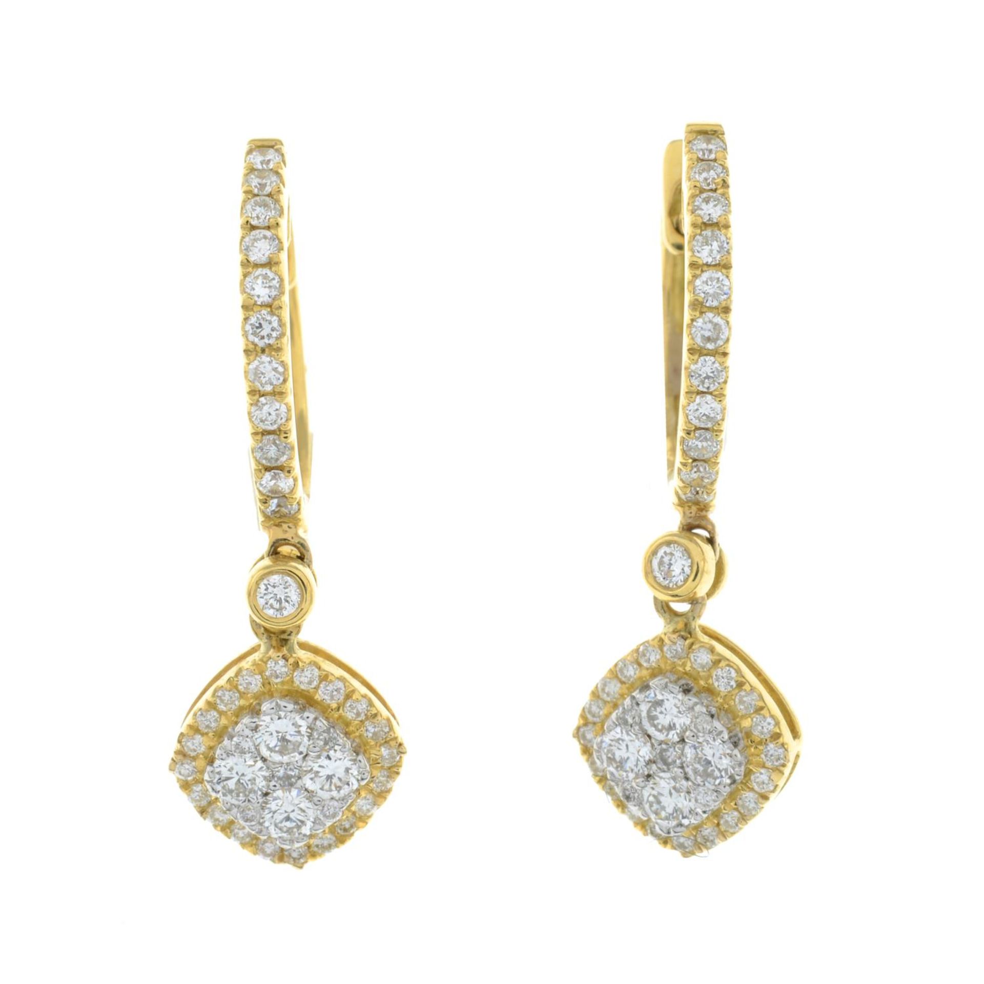 A pair of 18ct gold brilliant-cut diamond earrings.Total diamond weight 0.58ct,