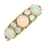 An early 20th century opal cabochon and old-cut diamond ring.