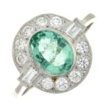 An emerald and vari-cut diamond cluster ring.Emerald weight 1.25ct.Total diamond weight