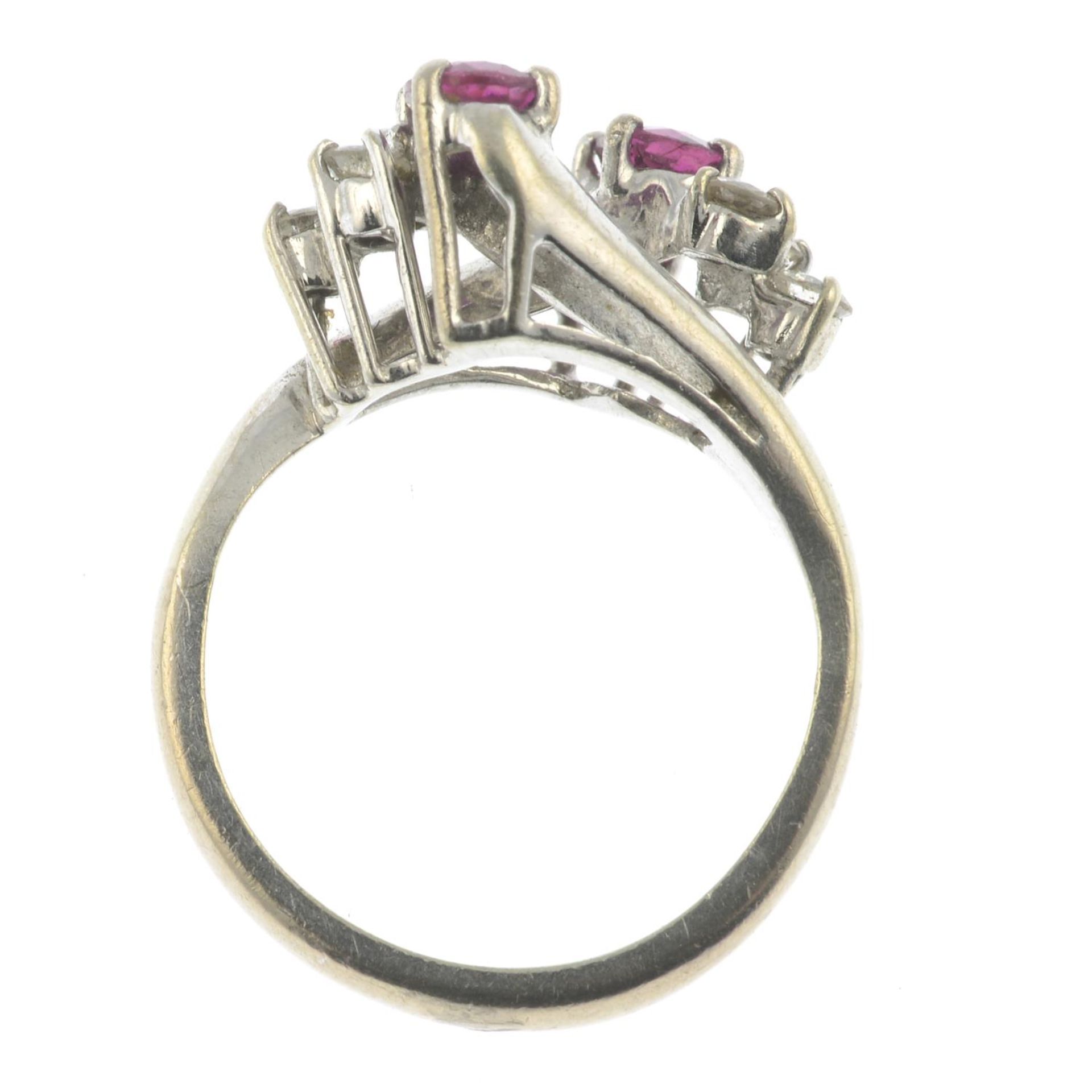 A ruby and brilliant-cut diamond crossover ring.Estimated total diamond weight 0.20ct, - Image 4 of 4