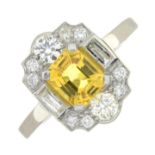 A yellow sapphire and vari-cut diamond cluster ring.