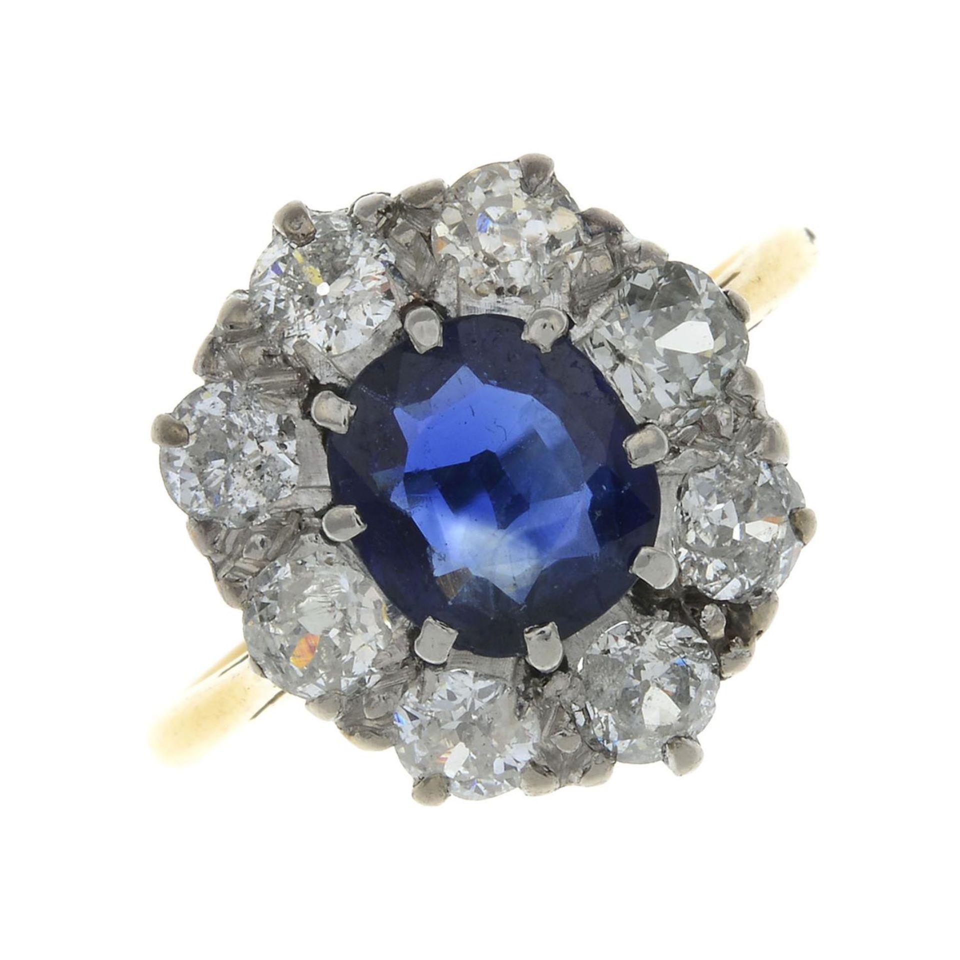 A sapphire and old-cut diamond cluster ring.With Verbal,