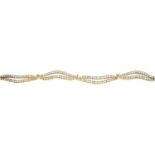 A pave-set diamond bracelet.Estimated total diamond weight 2.40cts.Length 18.5cms.